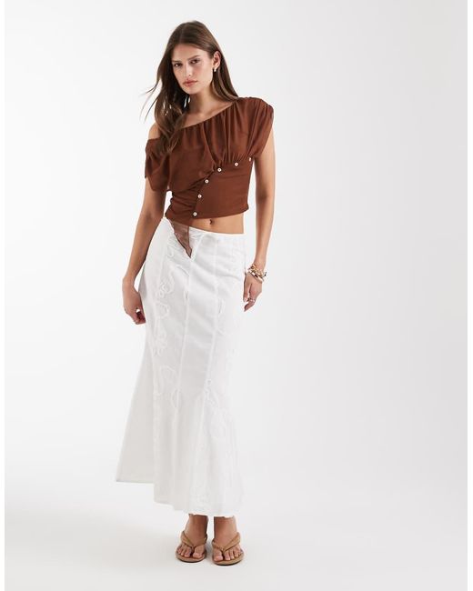 Gemini di laagam in Brown
