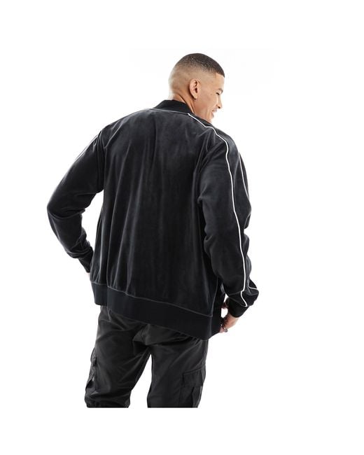 Club - veste en velours Nike pour homme en coloris Black