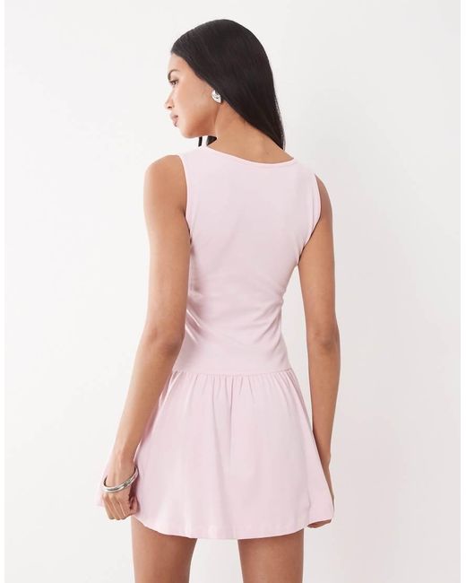 The Frolic Pink Exclusive V Neck Dropped Waist Mini Dress