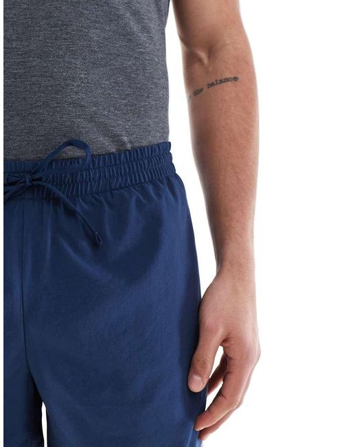 New Balance Blue Essentials 5 Inch Shorts for men