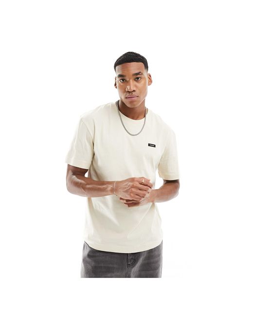 T-shirt en coton à coupe confortable - gris clair Calvin Klein pour homme en coloris White