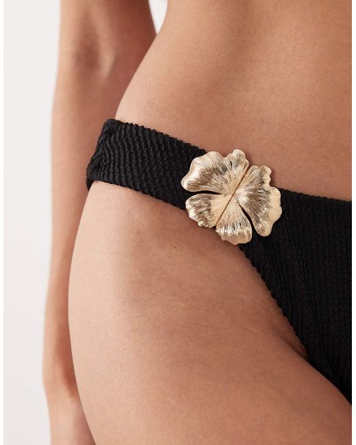 The Frolic Black Exclusive Crinkle Metal Flower Trim High Leg Brazilian Bikini Bottom