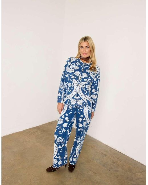 Never Fully Dressed Blue Amara Printed Ruffle Back Pocket Detail Straight Leg Jeans