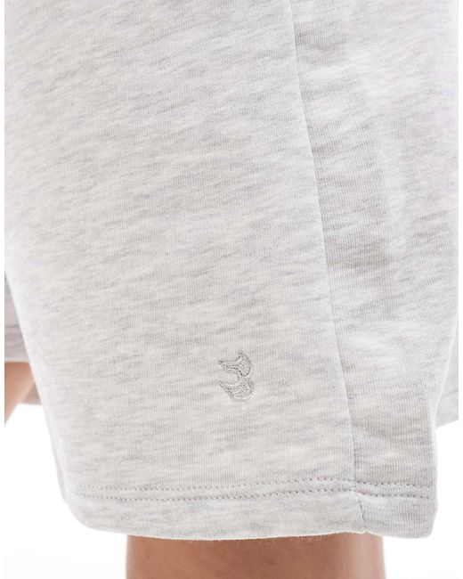 Bershka White – longline-sweatshorts