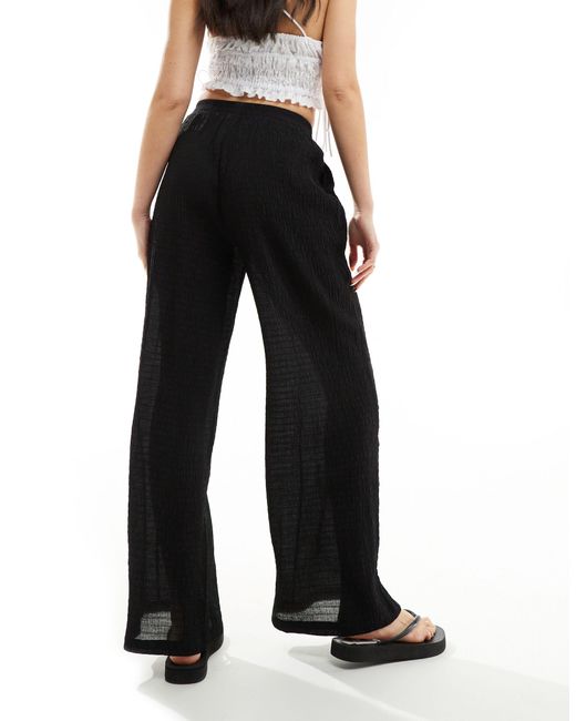Pantalon ample effet froissé Bershka en coloris Black