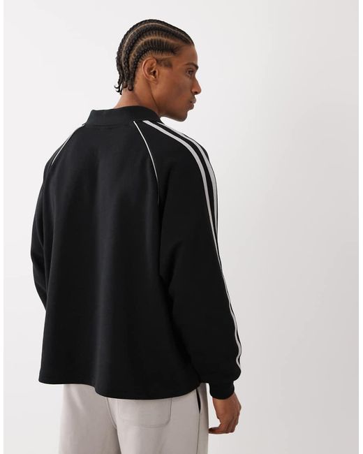 Cotton On Black Raglan Polo Fleece for men