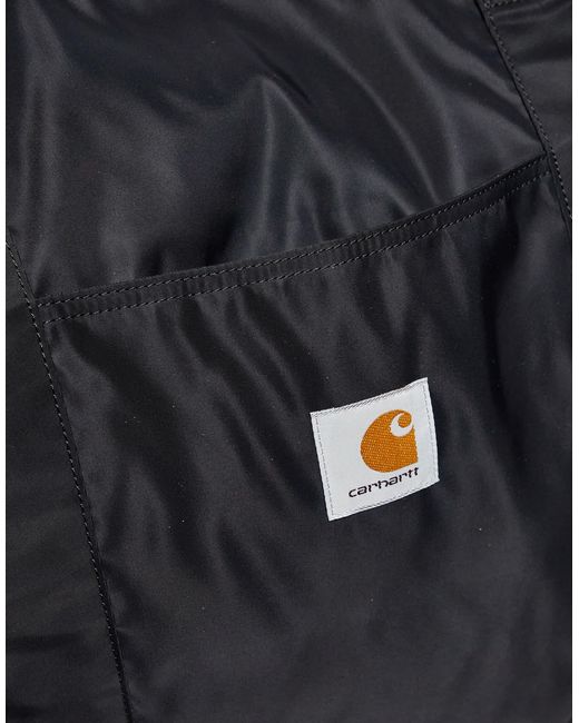 Alumni - tote bag avec bandoulières contrastantes Carhartt en coloris Black