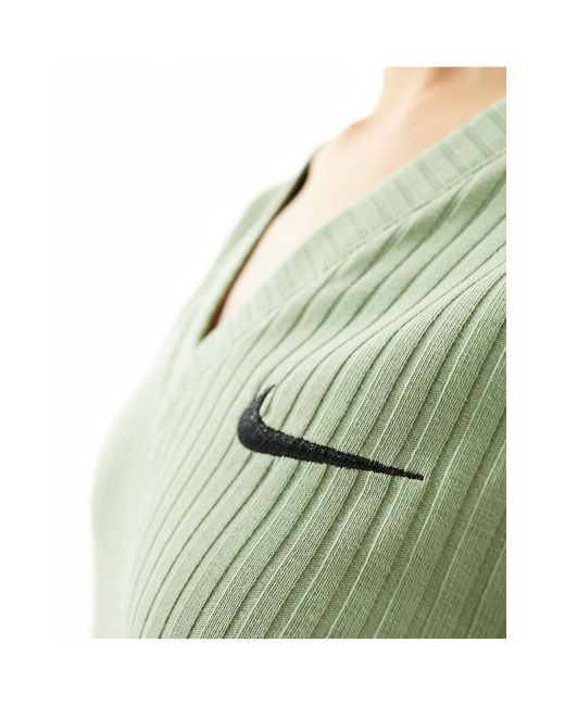 Top tendance à manches longues et col en v en jersey côtelé - pétrole Nike en coloris Green