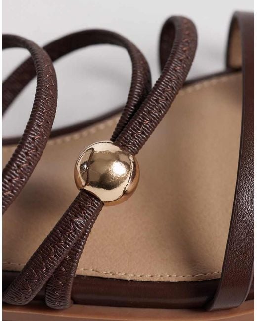 Raid Brown Moon Flat Sandals With Metal Detail