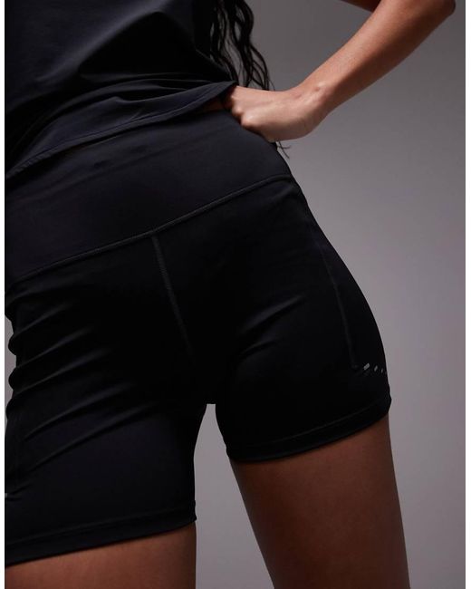 Leggings Cortos De 4" Negros De Talle Alto Swift Dri-Fit De Nike de color Black