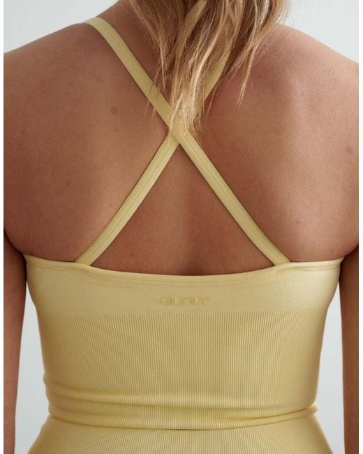 Bralette Amarillo Suave Moldeador Sin Costuras Con Tiras Cruzadas En La Espalda Shape De Aim'n de color Green