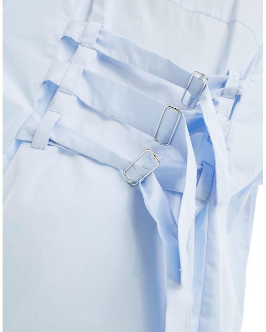 Camisa azul extragrande con hebillas en la espalda Collusion de color White