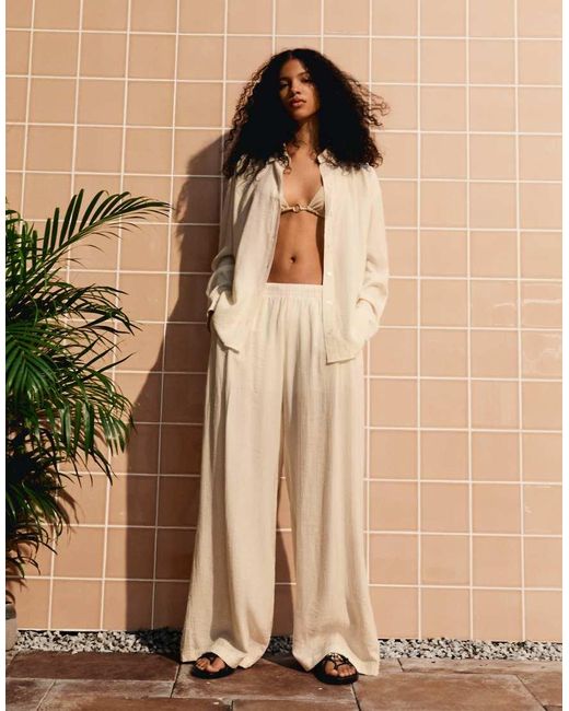 Bershka Natural Flowing Wide-leg Textured Trousers With Drawstring