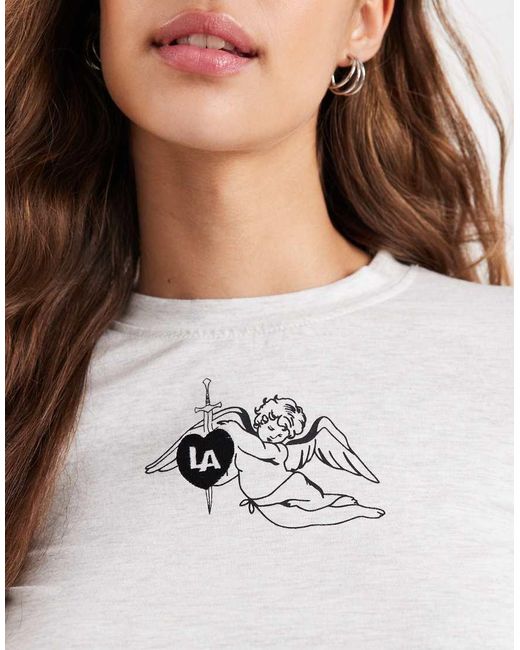 Daisy Street White Long Sleeve Baby Tee With Angel Graphic