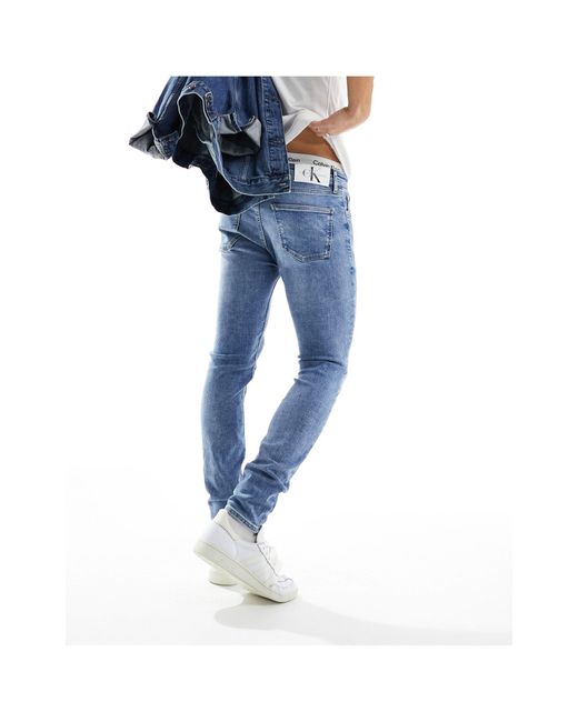 Jean super skinny - délavage moyen Calvin Klein pour homme en coloris Blue