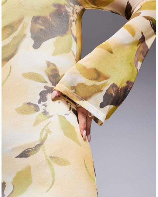Robe mi-longue en tulle à manches ange et dos ouvert avec liens et imprimé fleurs - jaune ASOS en coloris Metallic