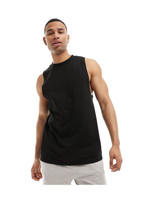 Camiseta deportiva negra sin mangas con sisas caídas ASOS 4505 de hombre de color Black