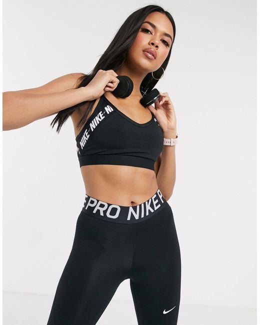 Nike Synthetic Indy Light Support Logo Taping Sports Bra in Black