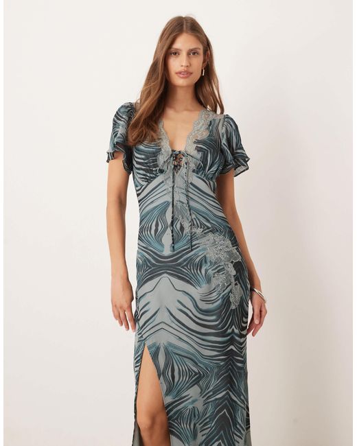 Robe longue à imprimé zébré avec liens noués à l'avant et détails en dentelle - gris ASOS en coloris Blue