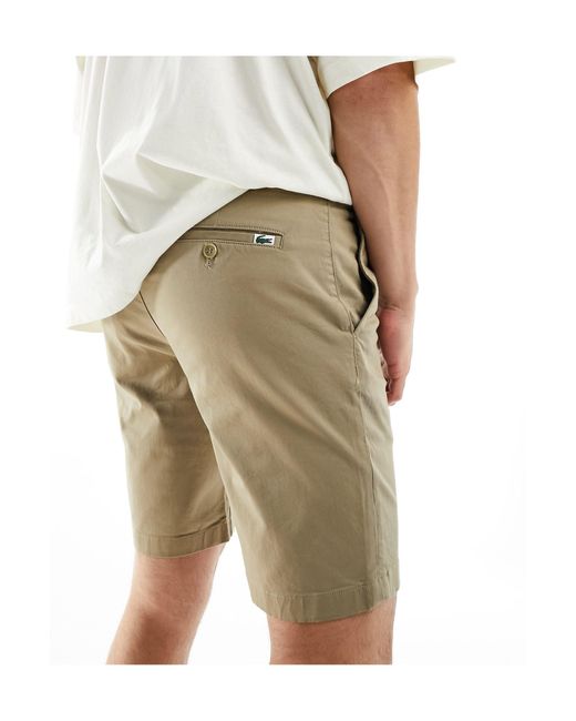 Lacoste – schmal geschnittene chino-shorts in Natural für Herren