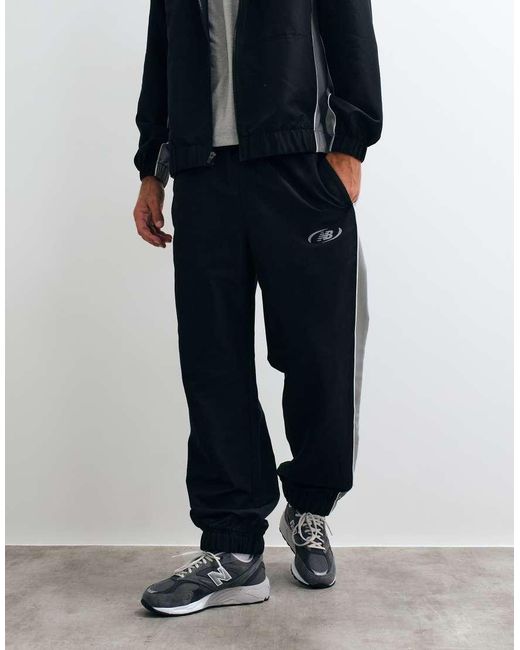 New Balance Gray Trackside Woven Pant for men