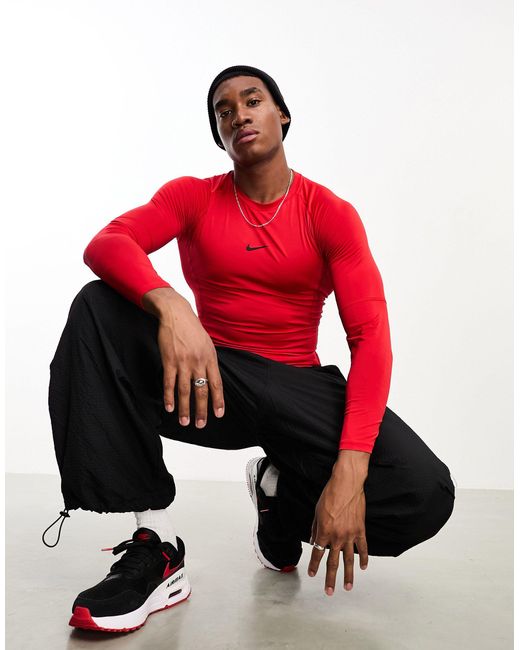 Pro dri-fit - t-shirt aderente rossa a maniche lunghe di Nike in Red da Uomo