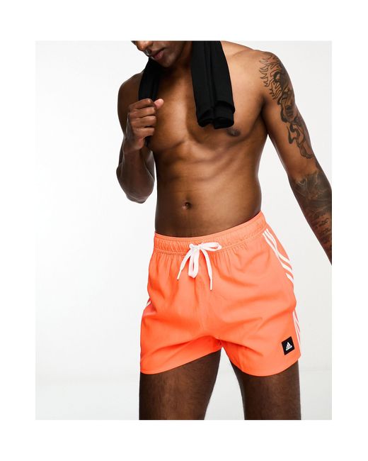 Adidas Originals Orange Adidas Swim 3 Stripe Shorts for men