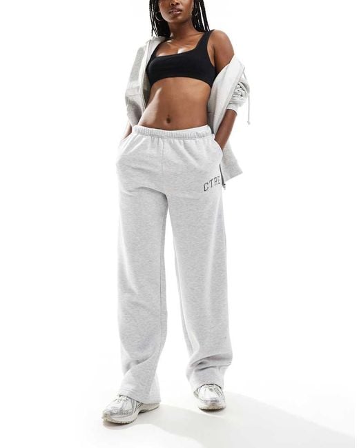 The Couture Club Ctre Varsity Wide Leg Trackies in White Lyst UK