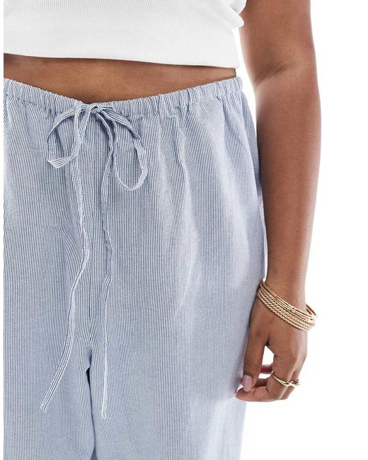 Pantalones Azul Claro A Rayas De Pernera Ancha Con Lazada En El Lateral De ONLY de color Blue