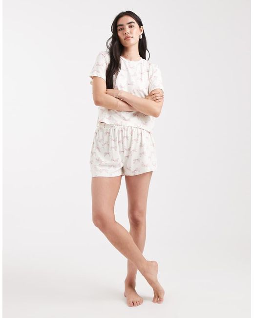 Pijama De Camiseta Y Pantalones Cortos Con Estampado De Lazos De -Blanco Loungeable de color White