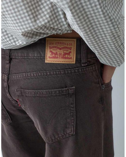 Jeans Ampi A Vita Super Bassa Scuro di Levi's in Multicolor