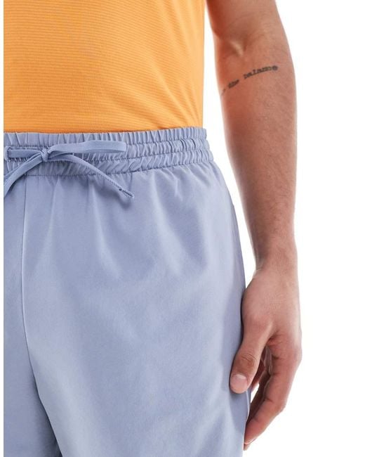 New Balance Blue Essentials 5"" Short for men