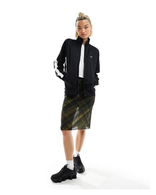 Streetwear - giacca sportiva nera con chiusura con zip di Nike in Black