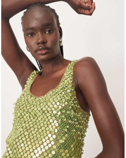 Vestito Corto A Canotta Trasparente Lime Con Decorazioni Effetto Metallizzato E Fondo Grezzo di ARRANGE in Multicolor