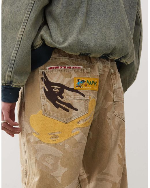 Aape by a bathing ape - jean motif camouflage - beige Aape By A Bathing Ape pour homme en coloris Natural