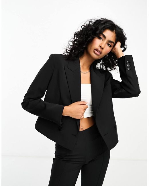 Americana Corta Negra Capsule De Mango de color Black