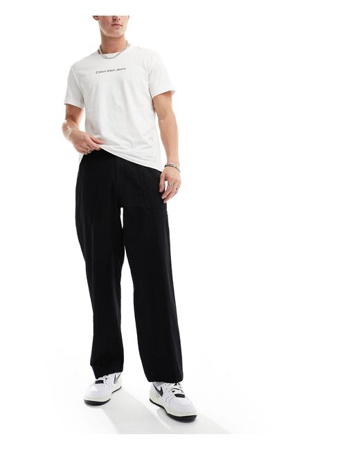 Pantalones negros Calvin Klein de hombre de color White