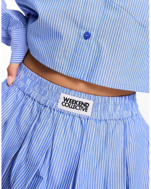 Minifalda azul a rayas plisada con etiqueta ASOS de color Blue