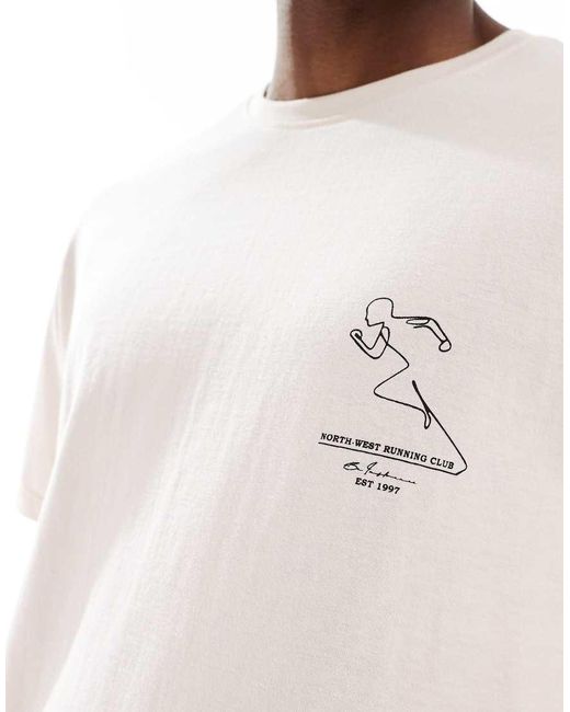 Camiseta Rosa Extragrande Con Estampado Gráfico Deportivo De Another Influence de hombre de color White