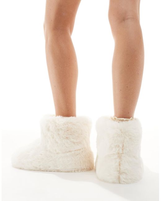 Chaussons style bottines confortables en fausse fourrure - crème Loungeable en coloris White