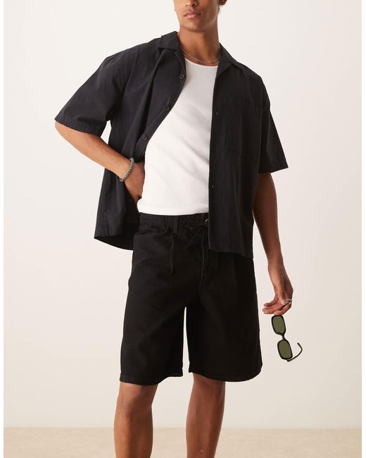 Short mi-long ample en jean noué devant - délavé ASOS pour homme en coloris Natural