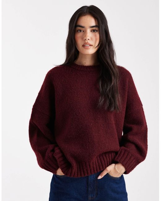 Pull oversize à col ras ASOS en coloris Red