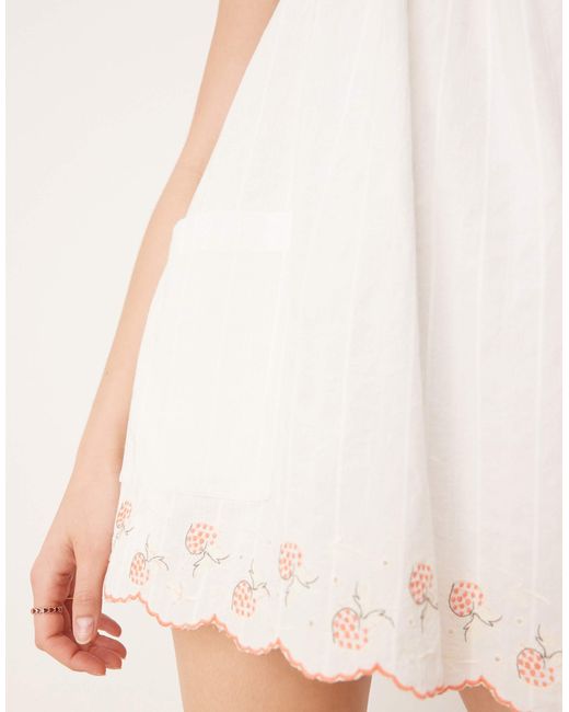 Latecia - robe babydoll courte à détails smockés - ivoire Free People en coloris Natural