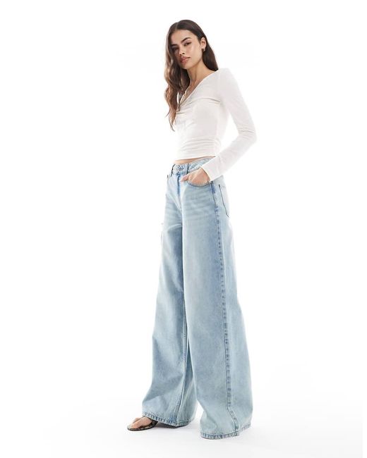 Vaqueros De Talle Alto Y Pernera Ancha Con Lavado Vintage De Asos Design Tall-Azul ASOS de color Blue