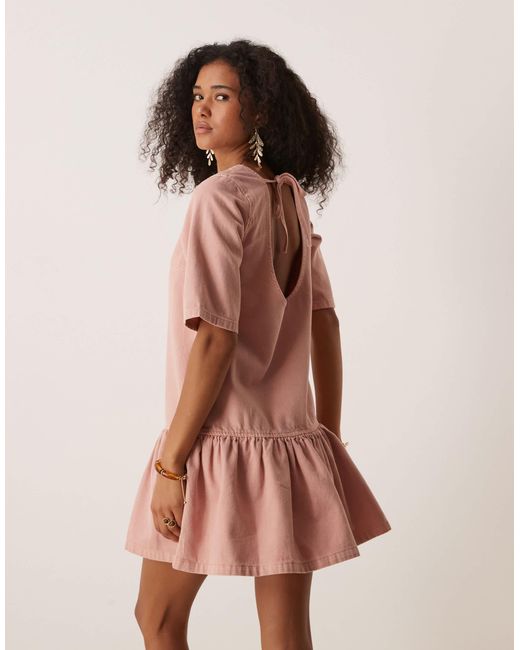 Robe t-shirt courte en denim avec taille basse - rose ASOS en coloris Pink