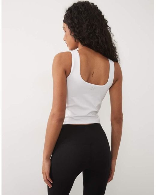 4505 White Soft Touch Scoop Neck Vest With Inner Bra And Removable Padding