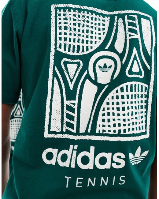 Camiseta verde unisex con estampado gráfico en la espalda tennis Adidas Originals de color Green