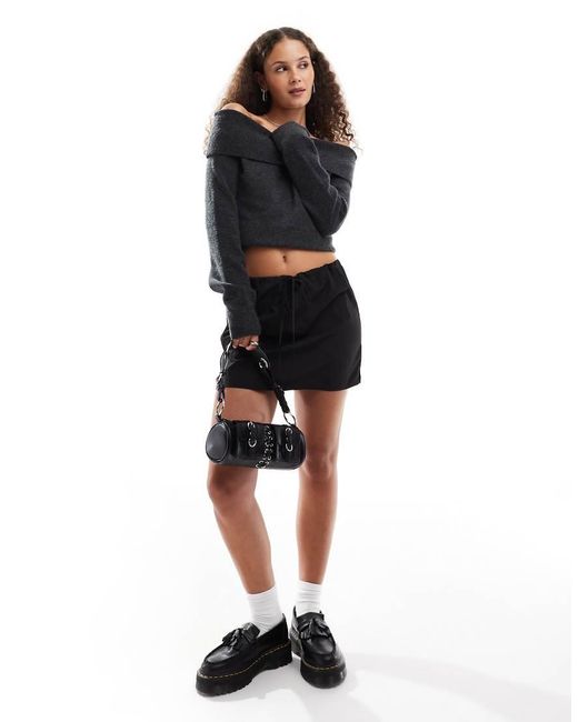 Jersey Negro Jaspeado Con Escote Bardot De Punto Lolo De Weekday de color Black