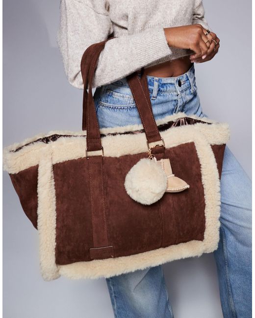 Cabas avec bords en fausse fourrure River Island en coloris Brown