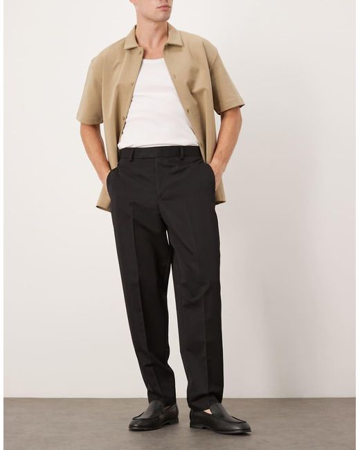 Pantalones De Vestir Negros De Corte Tapered Holgado De ASOS de hombre de color Black